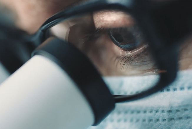Healthcare worker wearing protective glasses and a mask